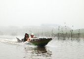 Foto: Women of the Tribe and Search of Freshwater Dolphins in Borneo